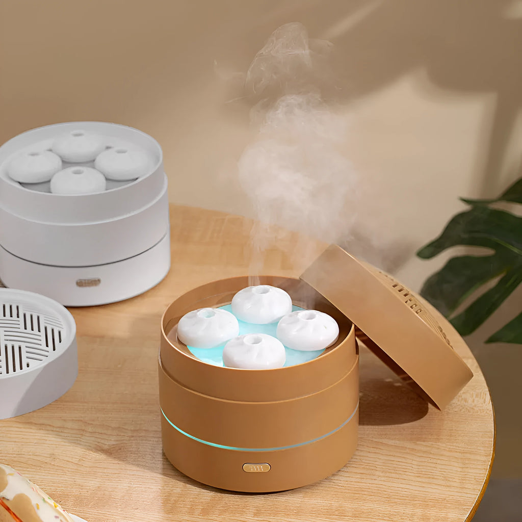 200ml USB ultrasonic aroma diffuser with four-spray design, steaming bun shape, and LED night light in Coffee or White