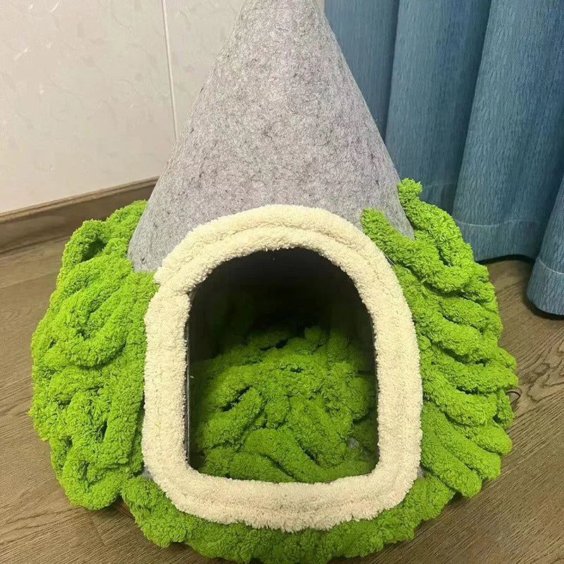 Grey conical felt cat house for indoor cats under 12 pounds.