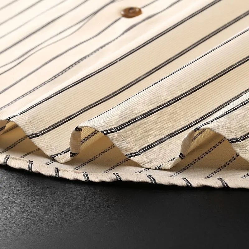 Coffee coloured striped men's long-sleeved shirt with a slim fit and wool lining on a hanger.