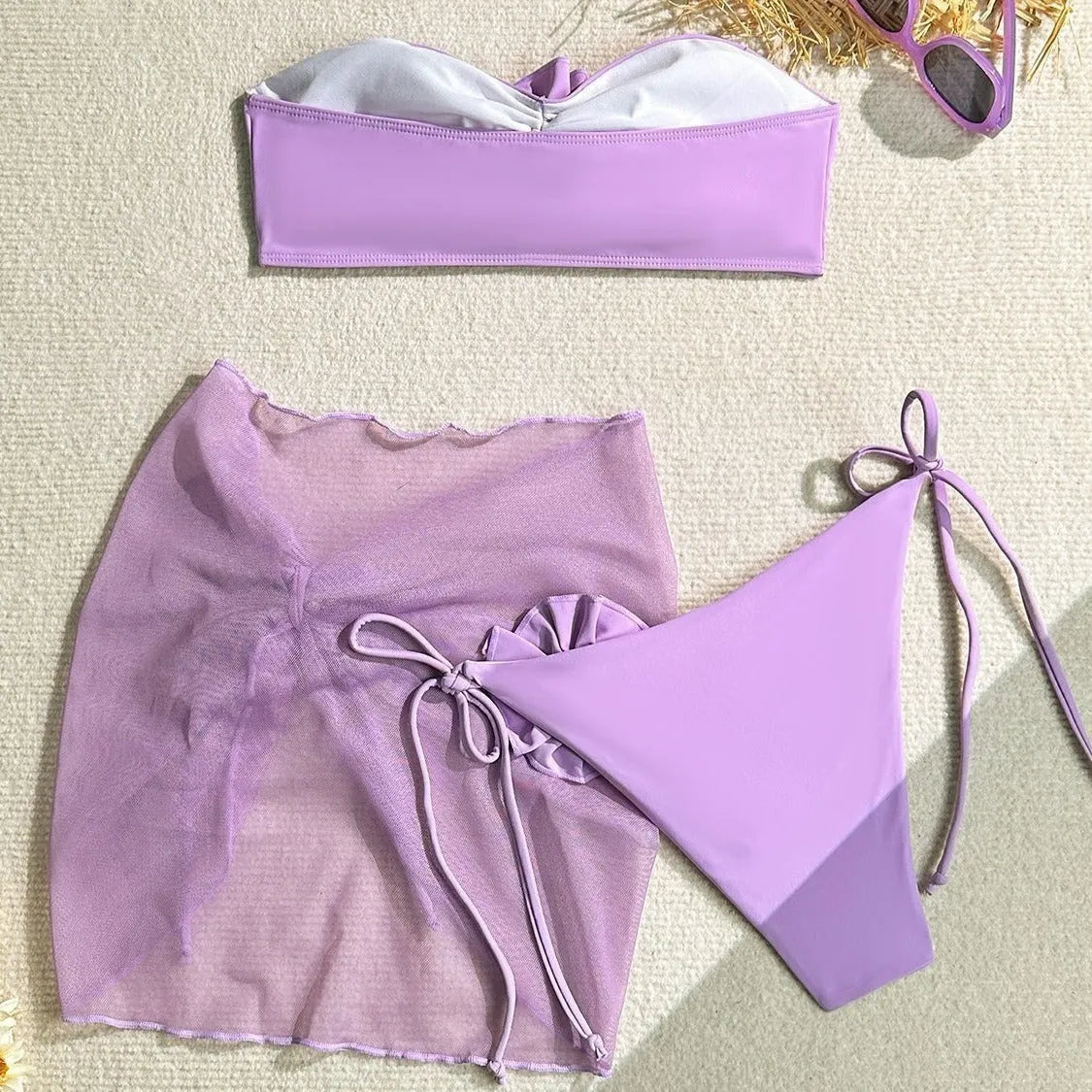 Women's pink tube top swimsuit with three-dimensional flower tie, matching skirt and pants for swimming