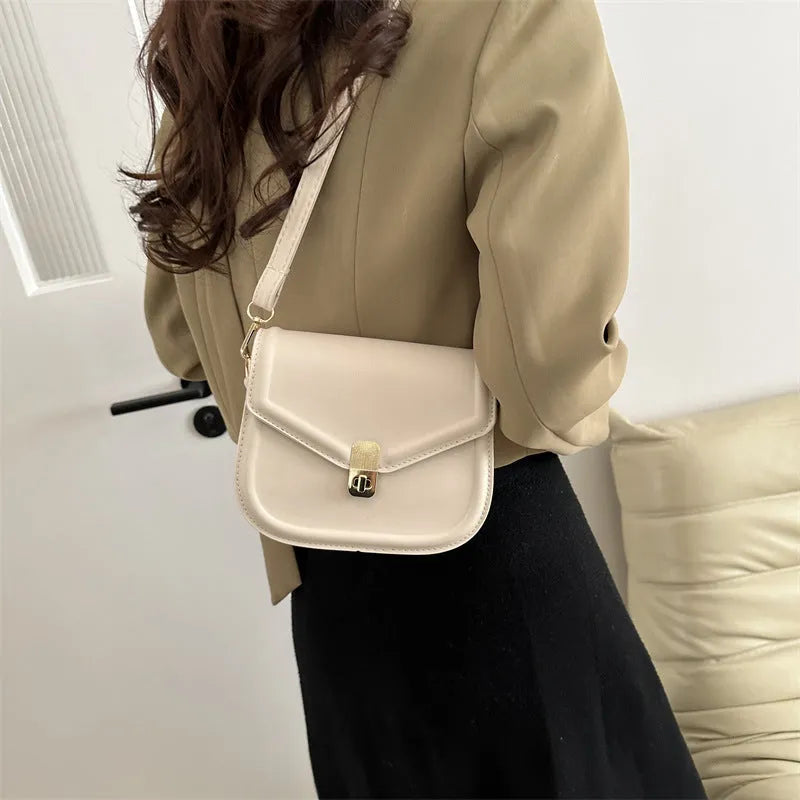 Niche Texture Shoulder Messenger Bag in clamshell design with soft PU material, shown in horizontal square shape.