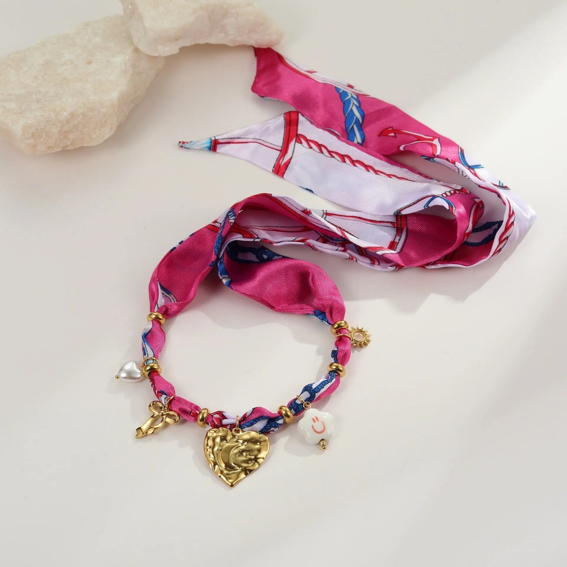 Geometric love pendant necklace and matching bracelet set with colourful silk scarf design on 18K stainless steel chain.