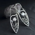 Silver lotus vine earrings with geometric retro design and round elements for women
