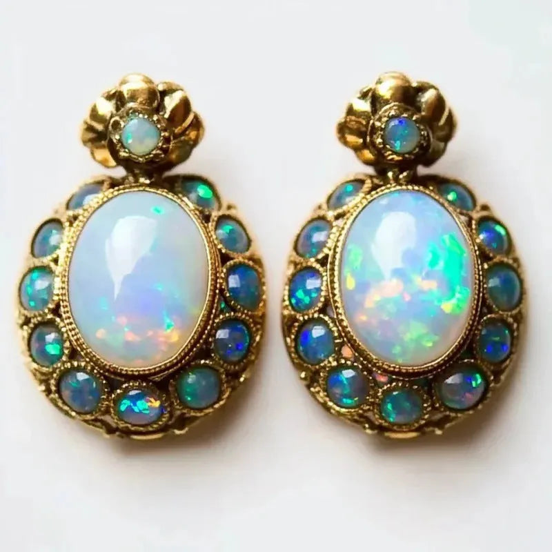 Gold-colour coloured gems earrings with geometric sunflower shape and inlaid gem setting, one pair