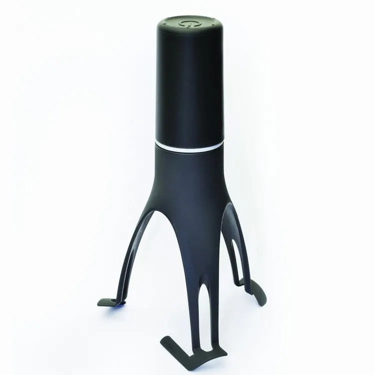 Green Uutensil Stirr automatic pot stirrer, a 22.2cm tall kitchen gadget for sauces and soups.