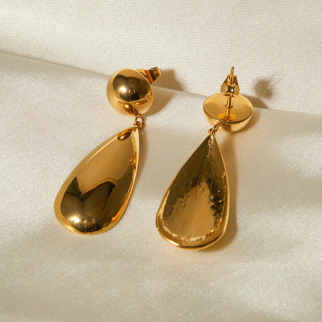 Gold electroplated stainless steel earrings with geometric hemisphere and water drop pendant design