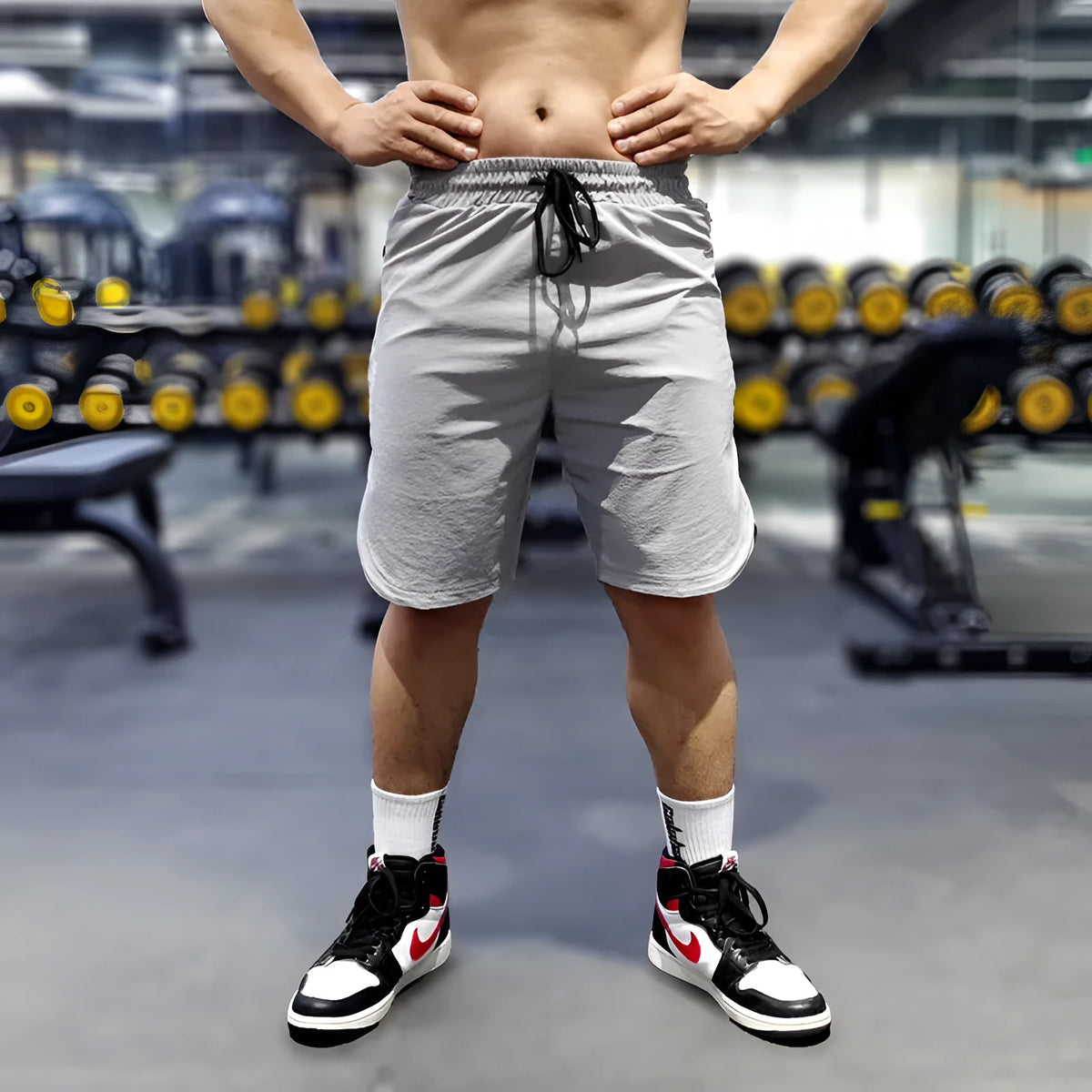 Men's quick-dry sports running shorts in black with contrast colour detailing