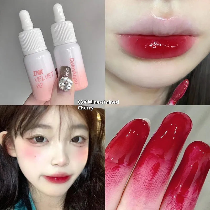 Mirror Lip Lacquer moisturising lip gloss tube in sheer shades on a plain background.