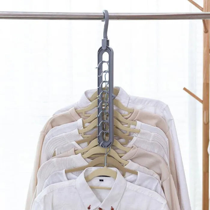 Plastic storage hanger with rotating handle in pink or green, 33 cm long, for heavy clothing