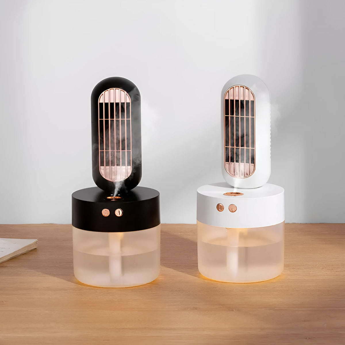 Small black and white desktop humidifier fan with shaking head oscillation and USB charging port