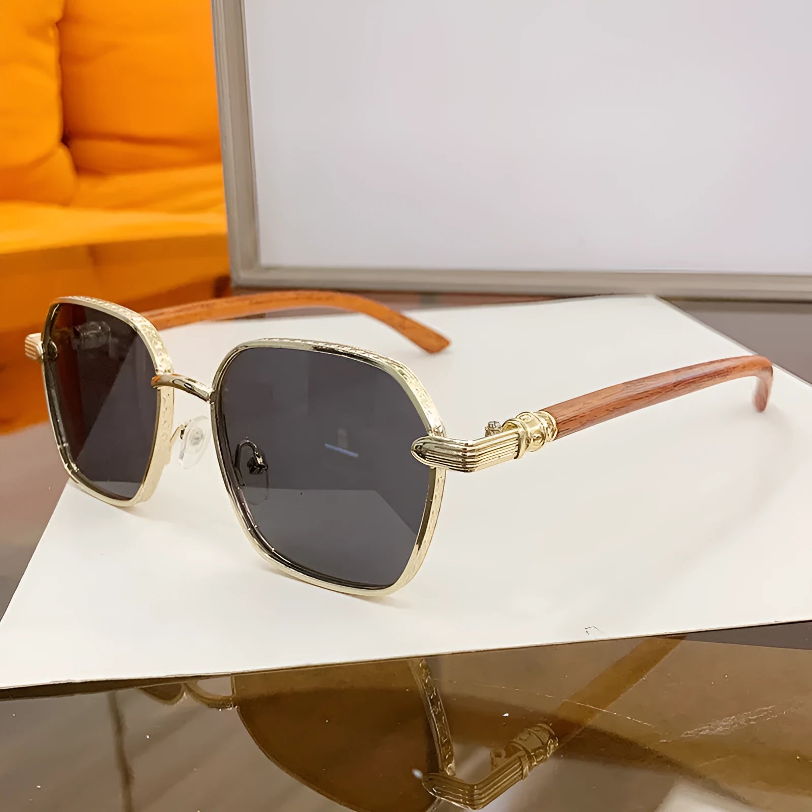 Frameless women's glasses with wood grain trim showing gold frame and double colour lens options