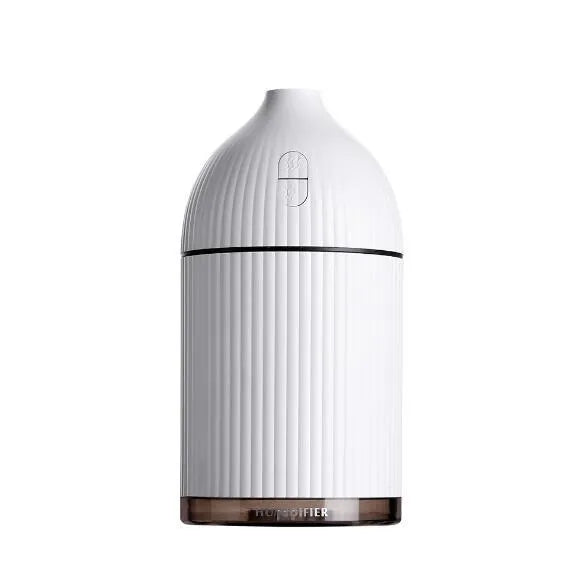 White ultrasonic aromatherapy diffuser with LED light, 300ml capacity, and USB cable on a wooden table