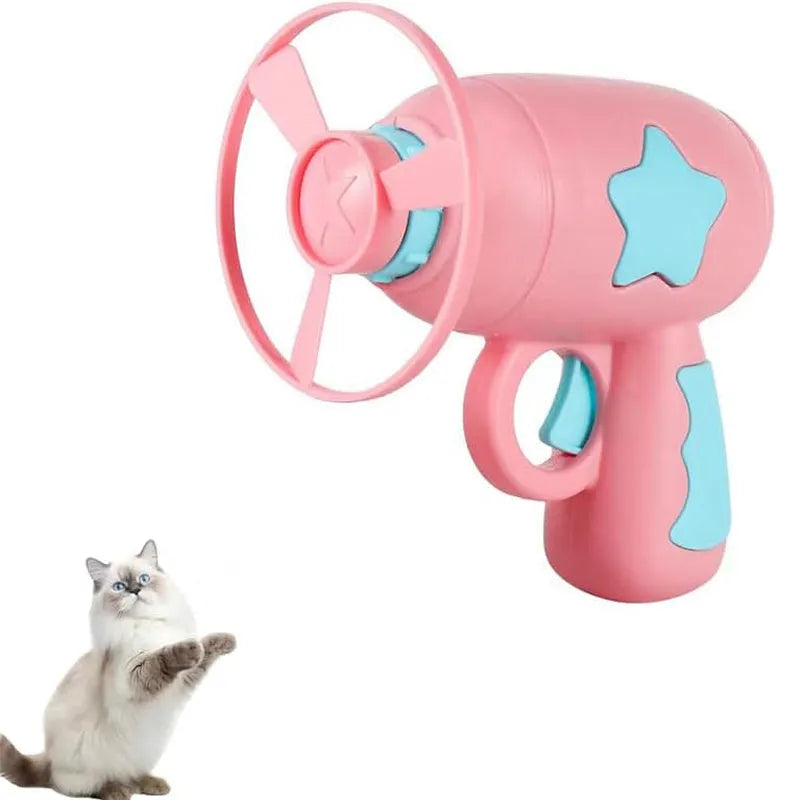 Blue and pink plastic cat toy gun with frisbee measuring 11cm long 10.5cm wide 7.5cm high