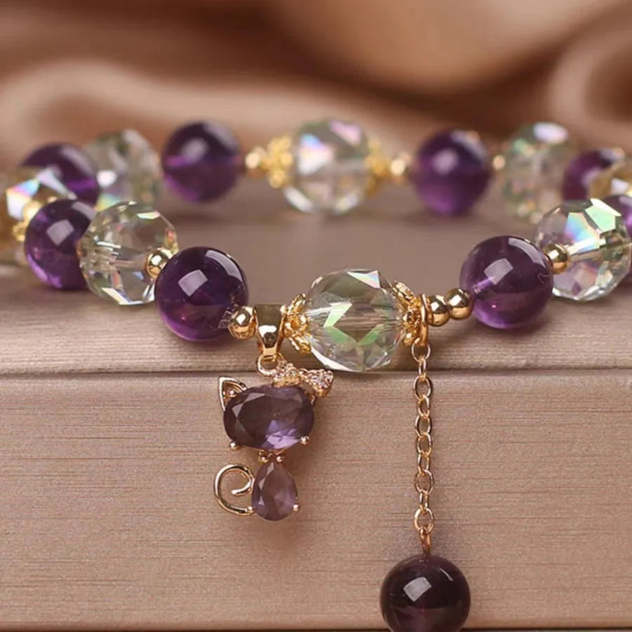 Antique style women's crystal bracelet with a nine-tailed fox pendant and a natural purple amethyst flower charm.