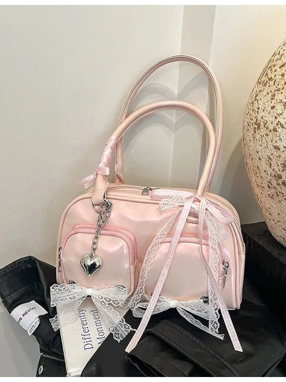 Beige PU shoulder bag with double straps and sewing thread detailing, showing horizontal square shape
