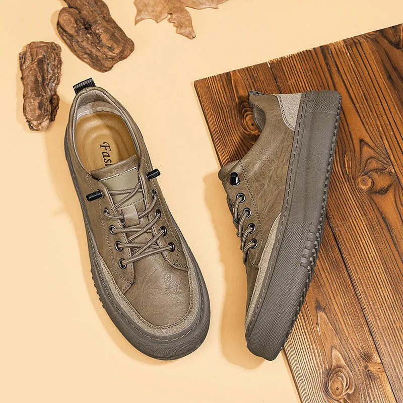 Men's black round toe leather casual shoes with lace-up closure and rubber sole