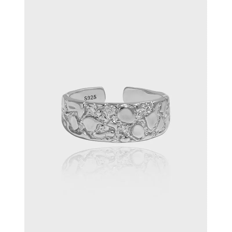 Adjustable opening silver ring with hammered texture in white gold colour finish