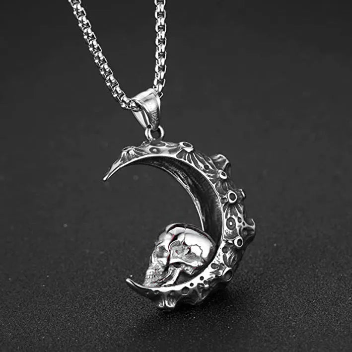 Men's silver alloy skull pendant necklace on a chain, showing design options like dagger, moon, and grimace.