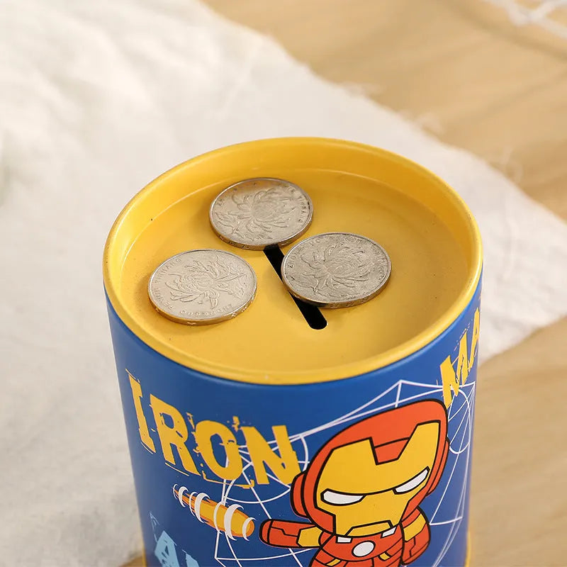 British style creative metal piggy bank for coin savings on a wooden desk.