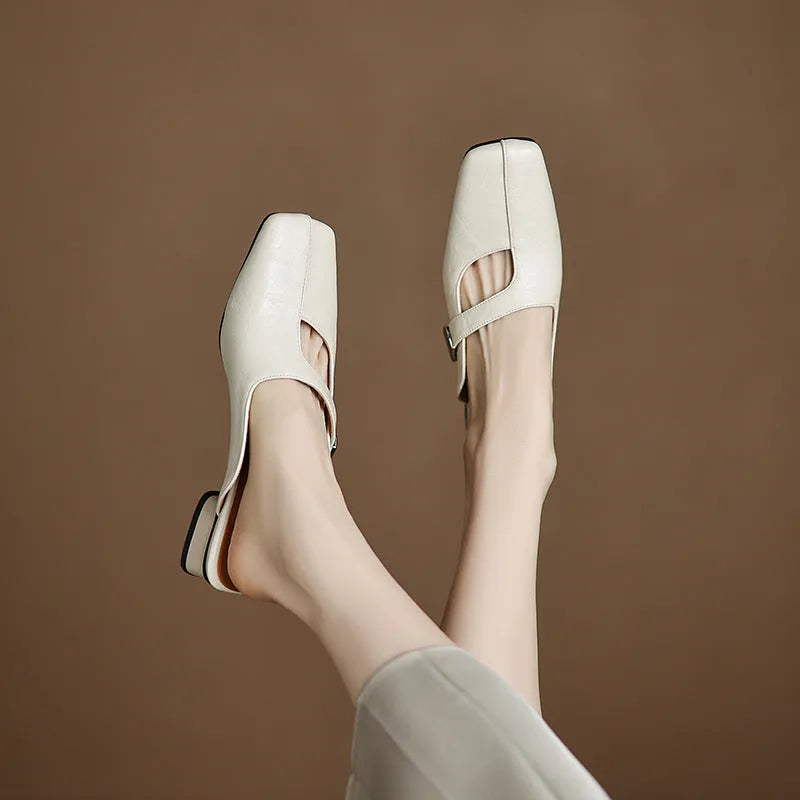 Square head outdoor slippers with low heel in black colour showing artificial PU upper and rubber sole