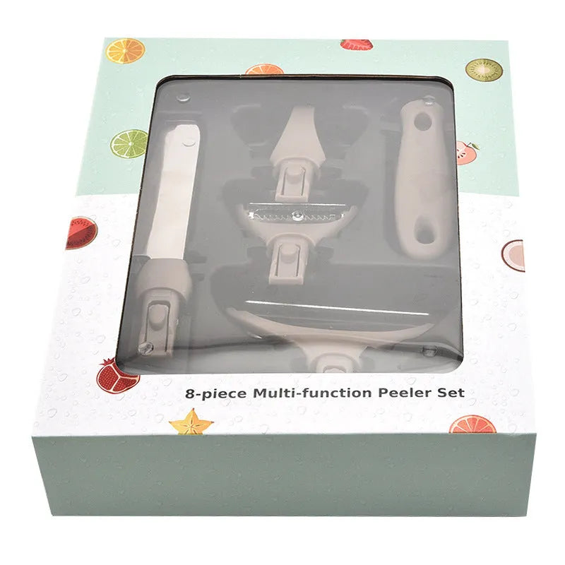 Green eight-piece kitchen tool set with peeler, cutter, and wheat straw chopping board on a counter.