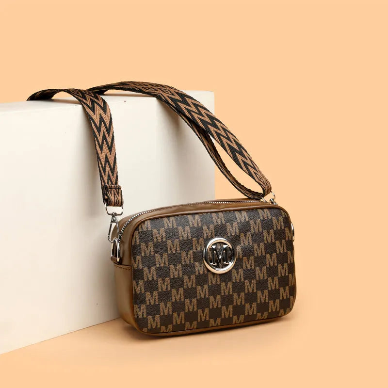PU leather wide-strap crossbody bag in black, brown or white with three-dimensional pocket design