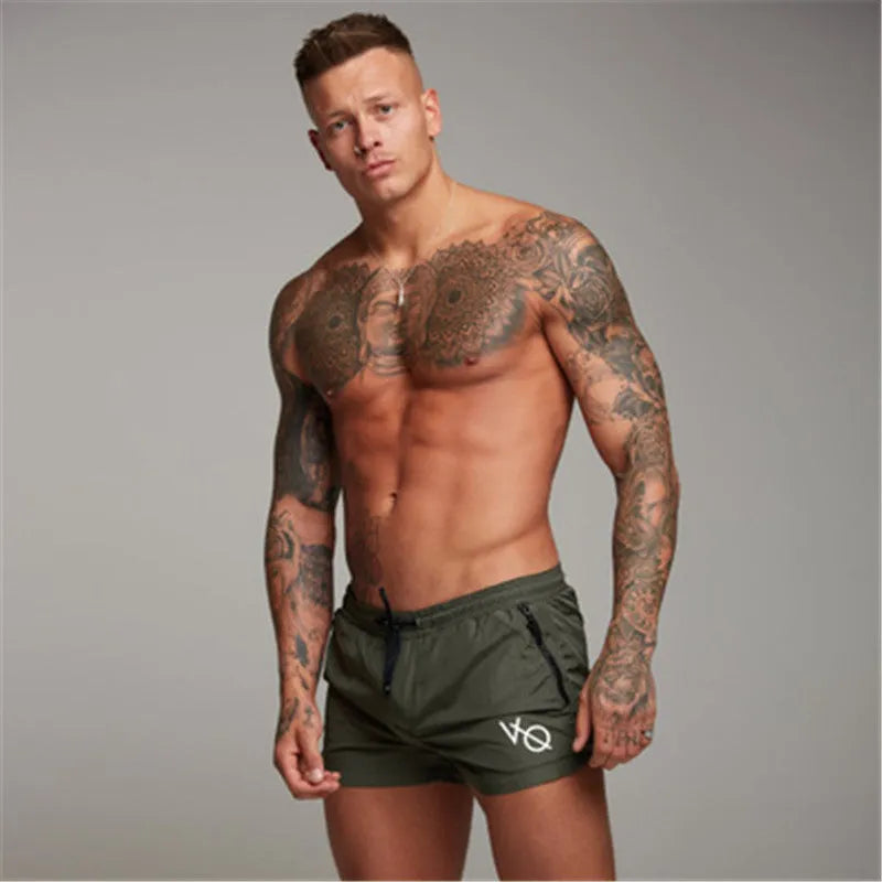 Men's nylon spandex swim shorts with elastic waist, available in green, black, navy, orange, sizes M-XXL