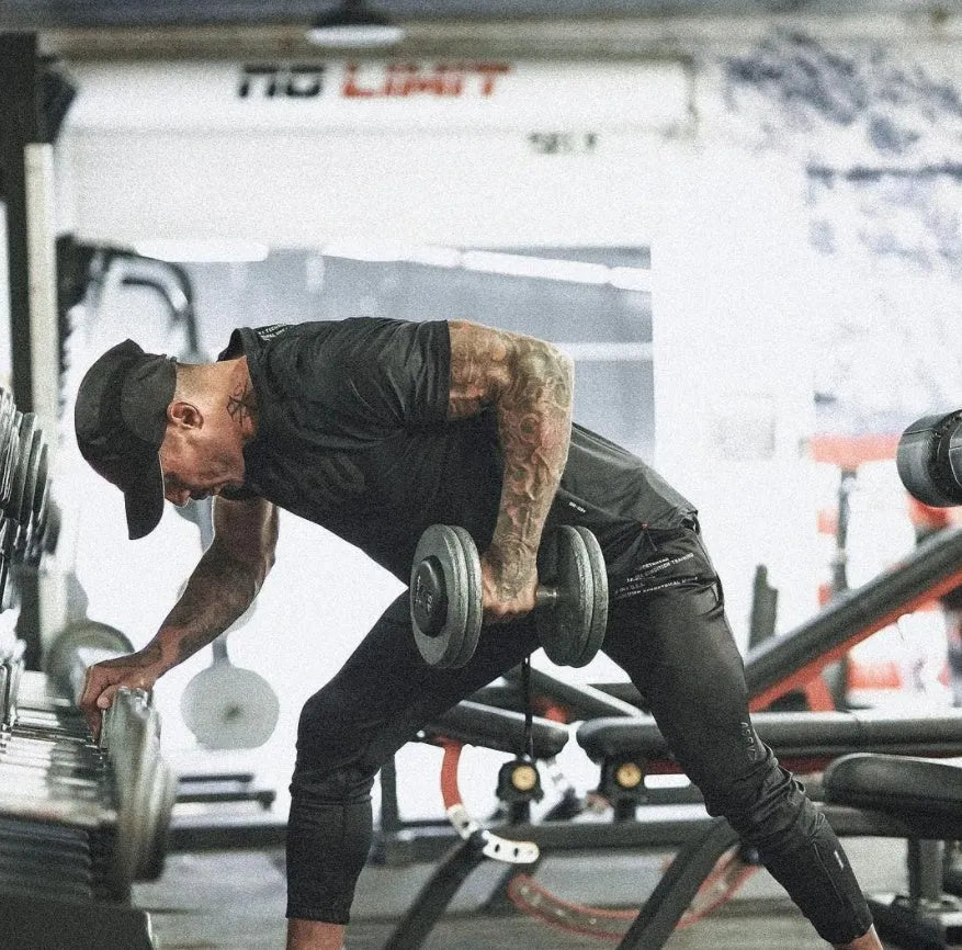 Plain men's fitness shirt in a cotton and spandex blend, shown in Army Green colour.