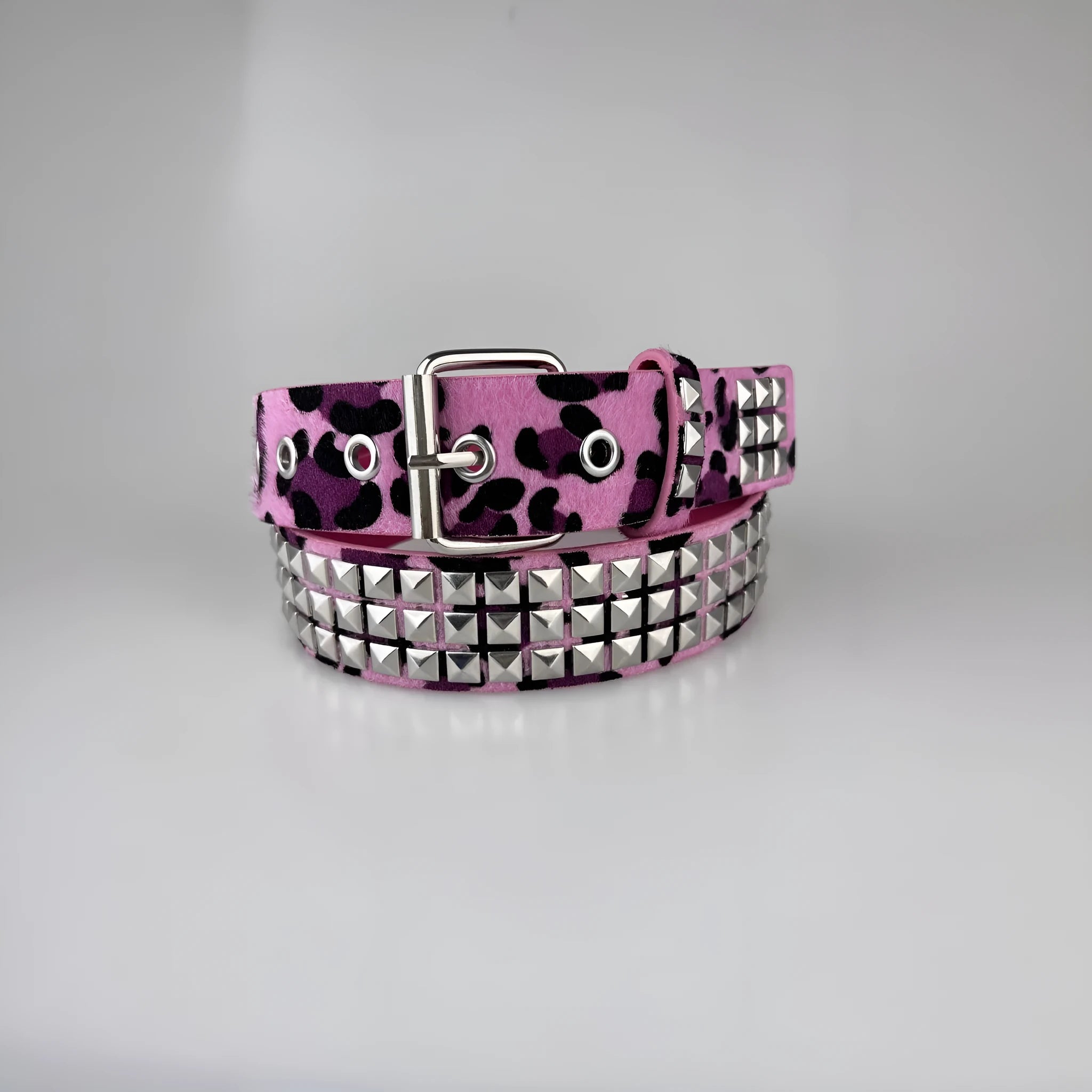 Women's brown leopard print belt with silver metal rivets and pin buckle fastening