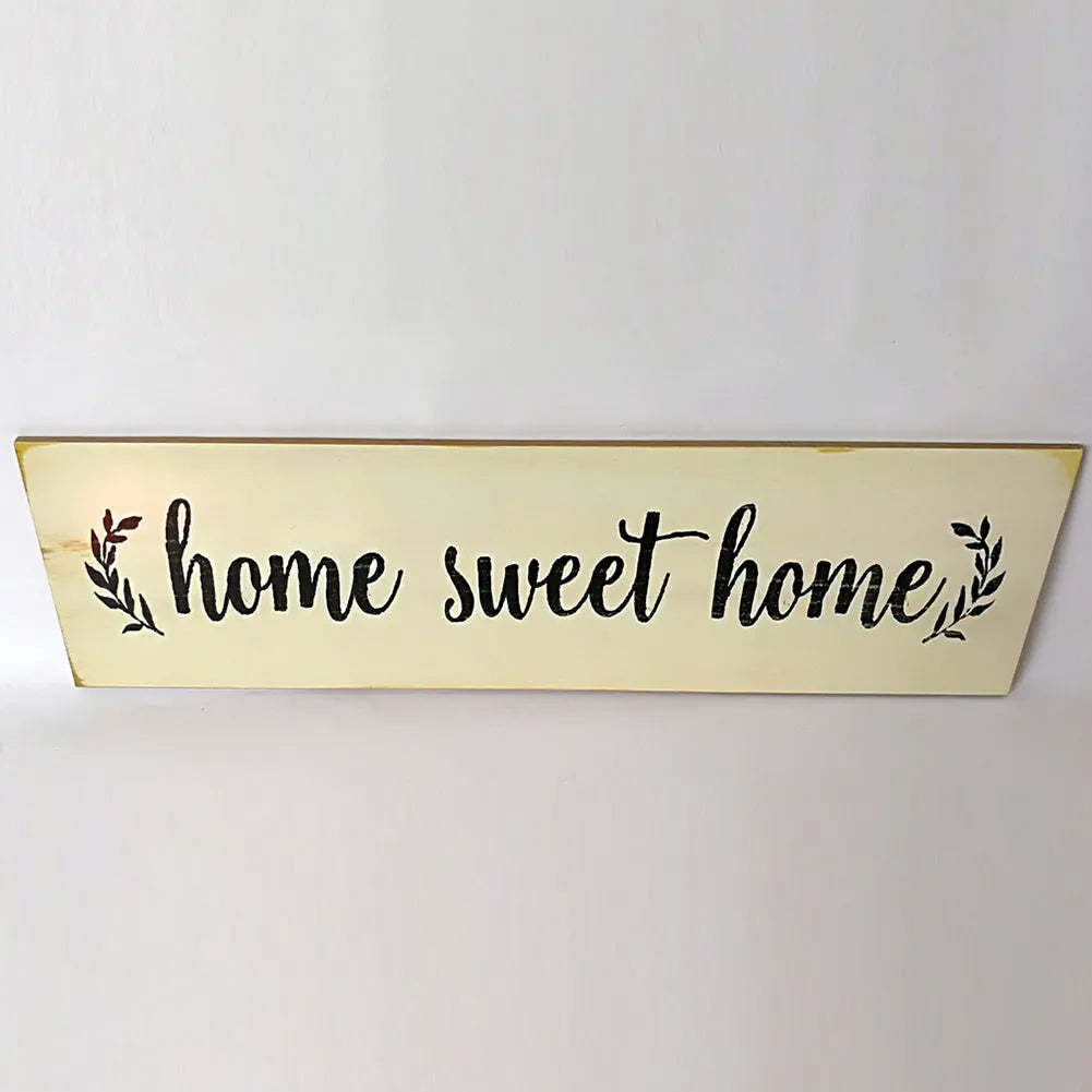 Wooden wall hanging ornament with carved design measuring 40cm by 12cm