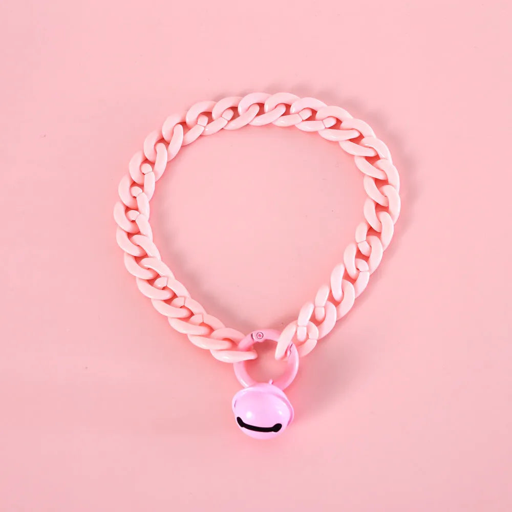 Adjustable pet collar in macaron candy colours with plastic construction and monochrome pattern
