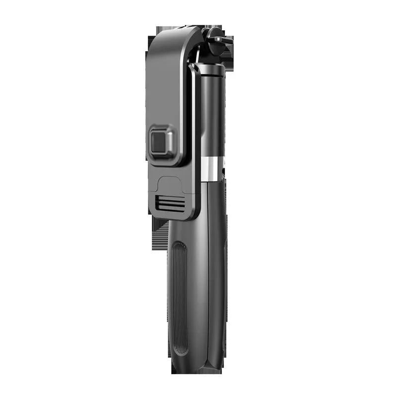 Black Bluetooth selfie stick extended to full length with phone attached, next to its wireless remote and tripod base.
