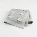 Pink and grey baby sheepskin blanket wind covers measuring 100cm by 80cm