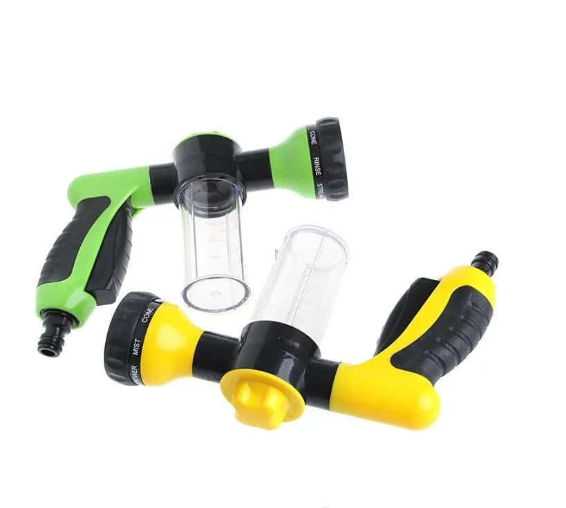 Green high-pressure foam spray gun with adjustable nozzle for car washing and household cleaning, showing eight spray types and 15cm by 21cm size
