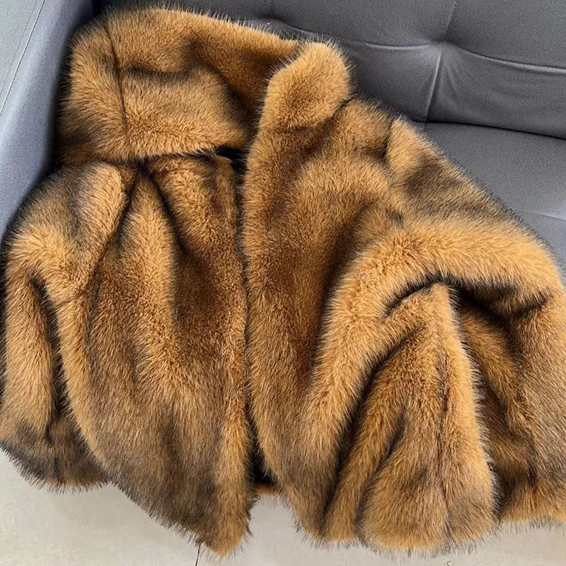 Silver grey artificial fur coat with 65cm length and regular sleeves, displayed on a model.