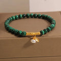 White crystal lucky bamboo bracelet for women with a high-rise design on a wrist.