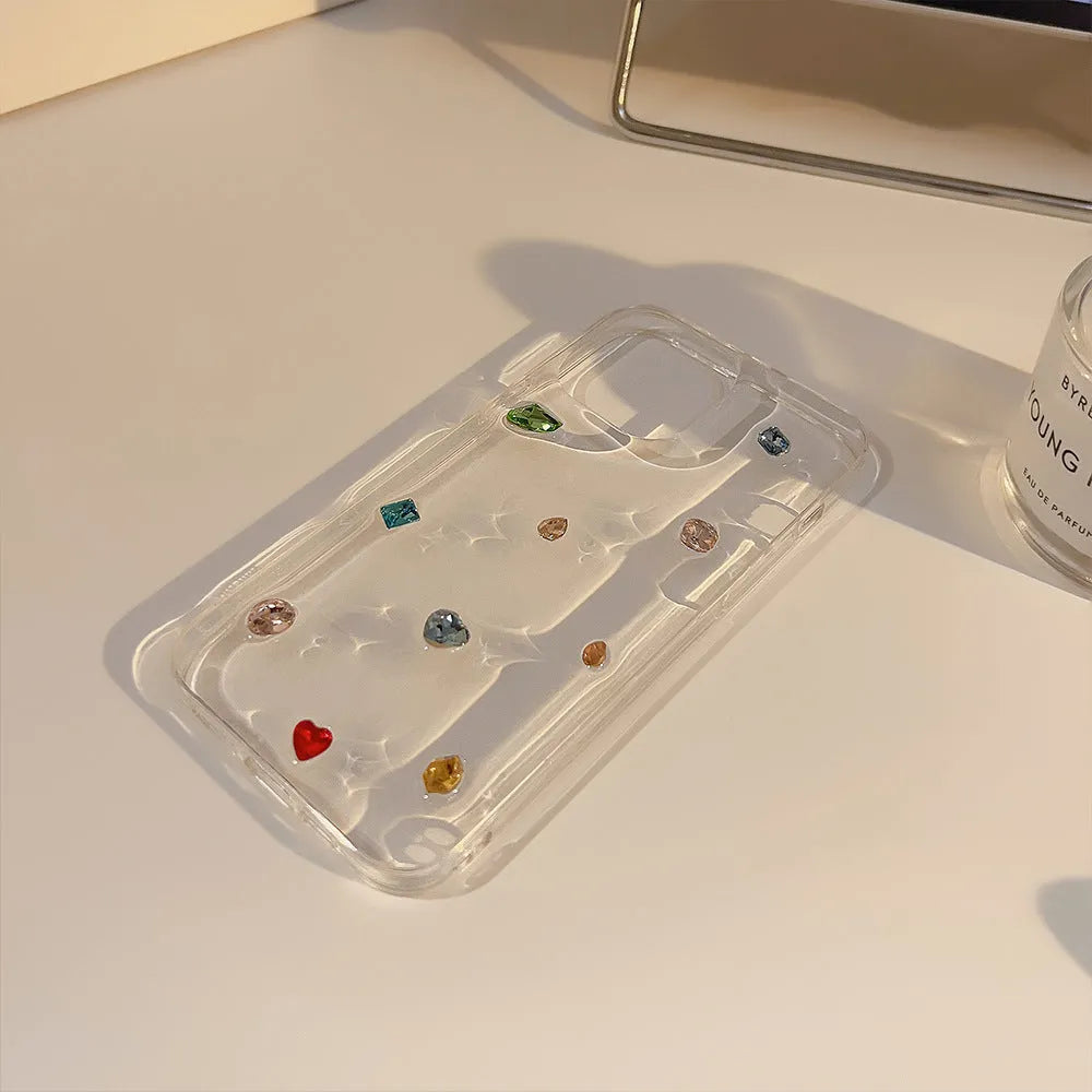 Crystal epoxy iPhone case with colourful rhinestones and love heart design on transparent TPU cover