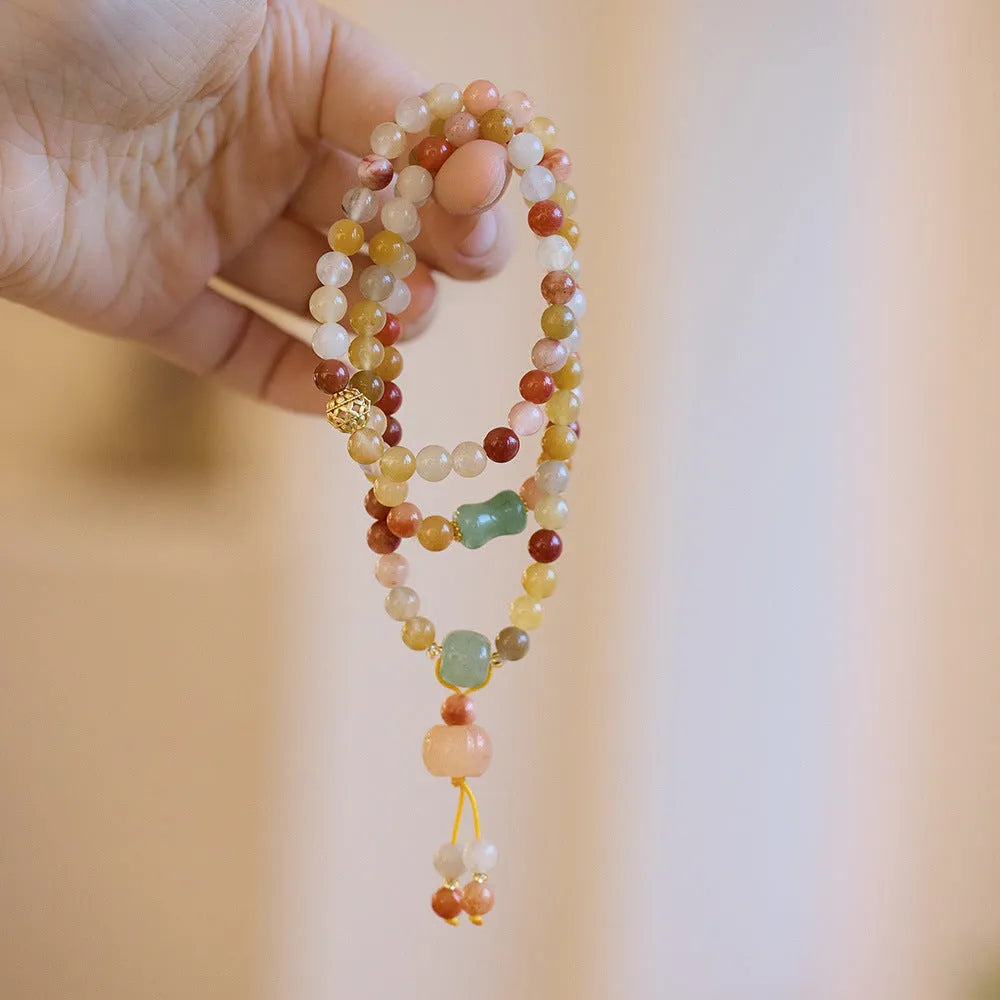 Women's three-circle pumpkin tassel jade bracelet with Jinsi Jade stones and handcrafted construction