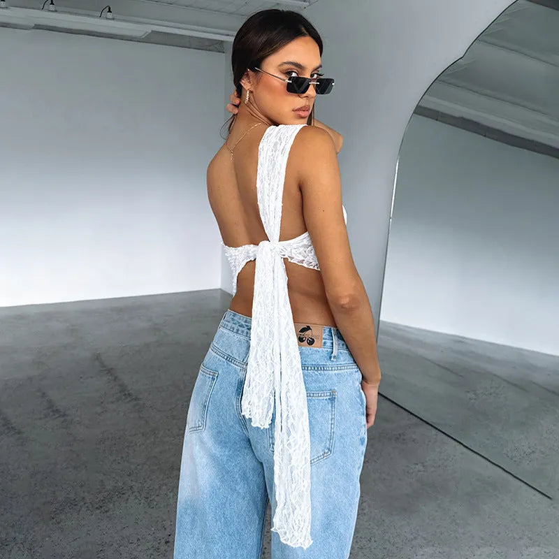 Women's backless vest with asymmetrical neckline and lace detailing in solid colour