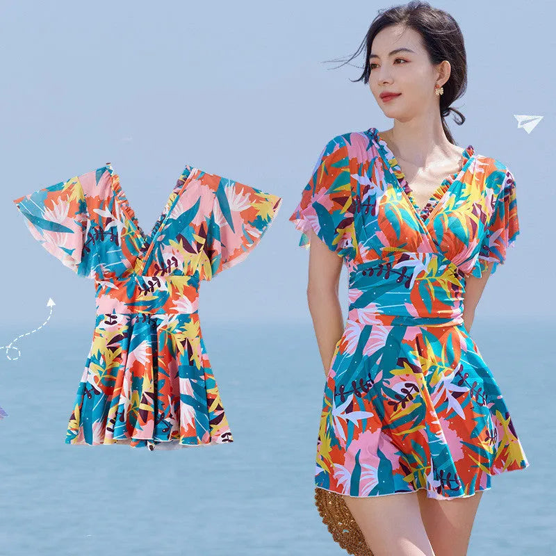 Women's cover belly one-piece swimsuit with colourful printed pattern in polyester fabric