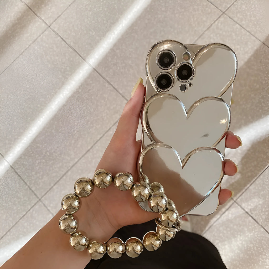 Soft TPU iPhone case with a shiny, three-dimensional electroplated love design on the back.