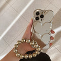 Soft TPU iPhone case with a shiny, three-dimensional electroplated love design on the back.