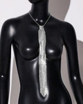 Arrow-shaped metal sequin bow tie in silver colour for adult festival wear.