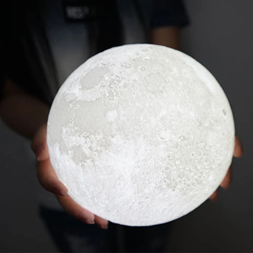 3D printed spherical moon lamp with visible surface contours and touch-sensitive metal ring at base