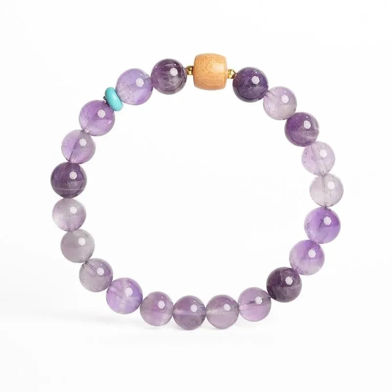 Natural purple amethyst crystal bracelet shown in 6mm and 8mm bead size options.