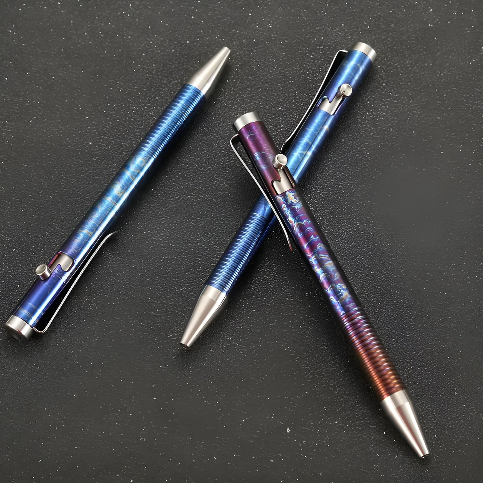 Titanium alloy bolt action pen with a colourful phantom finish and a gun-style bolt handle.