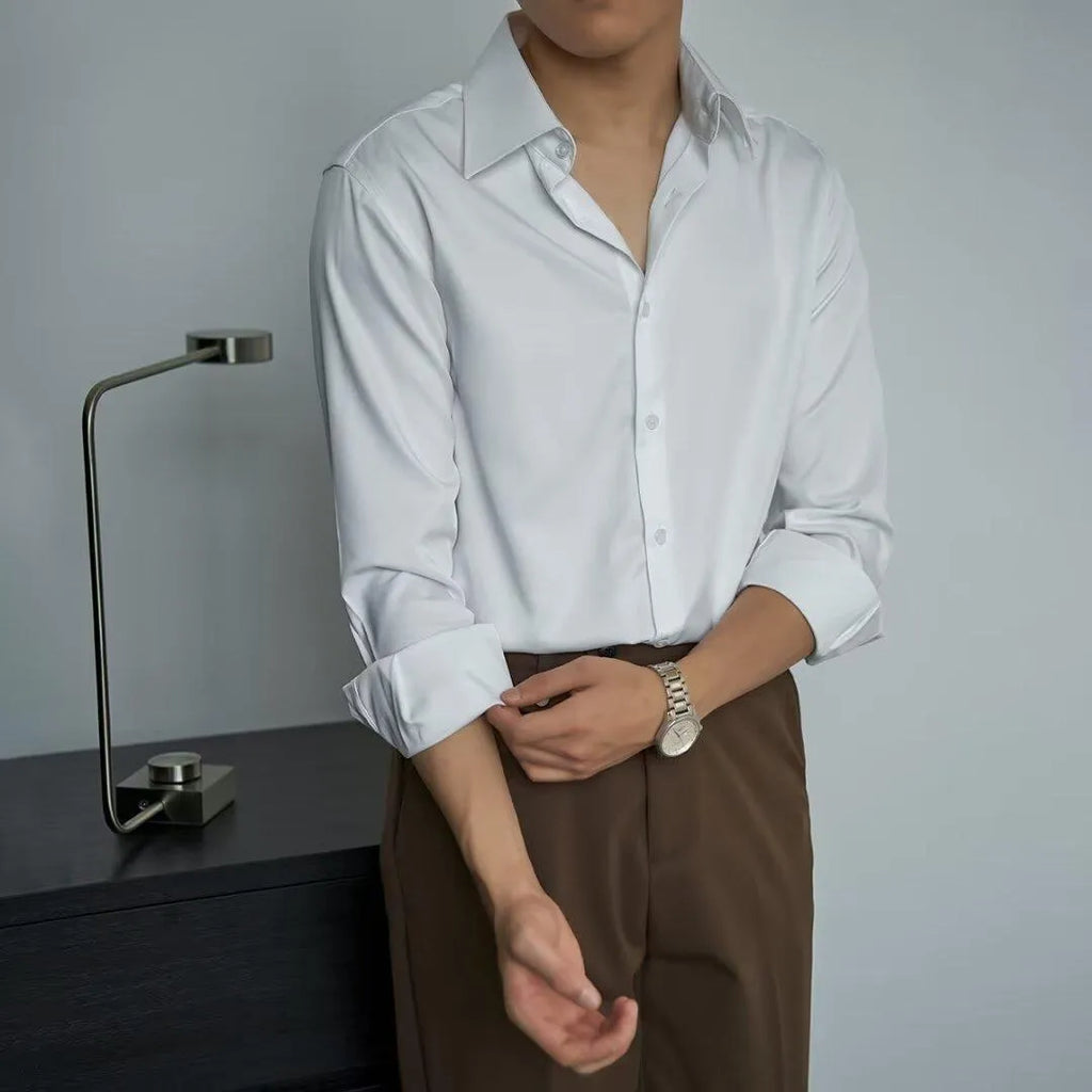Man wearing a black loose-fit long sleeve cardigan shirt in Korean slim style with Japanese retro details.