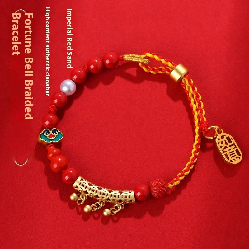 Red rope woven bracelet with round cinnabar charm and small bell for women