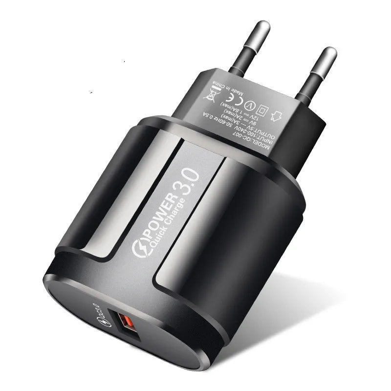 Black and white smart charger for mobile phones showing compact 20x40x65mm dimensions with UK plug
