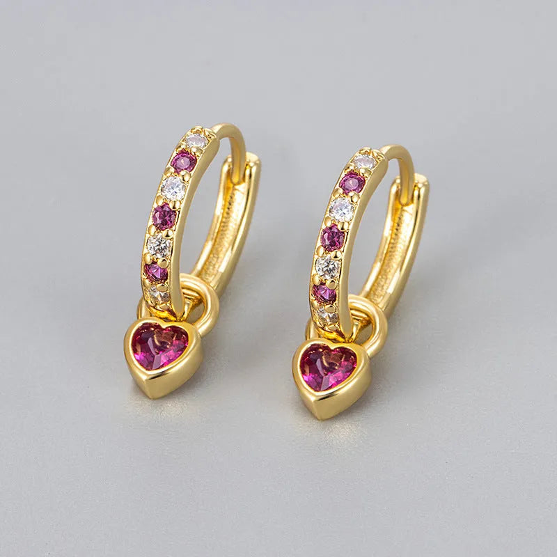 Fashion zircon earrings with heart-shaped eardrops in gold or white gold colour settings with diamond-treated gemstones